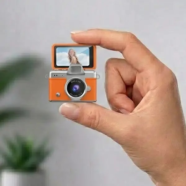 Mini caméra à écran rabattable – Vidéo résolution 1080P – Capteur d’image CCD – Écran HD IPS de 1,47″ – LK-027 – Orange — photo 1